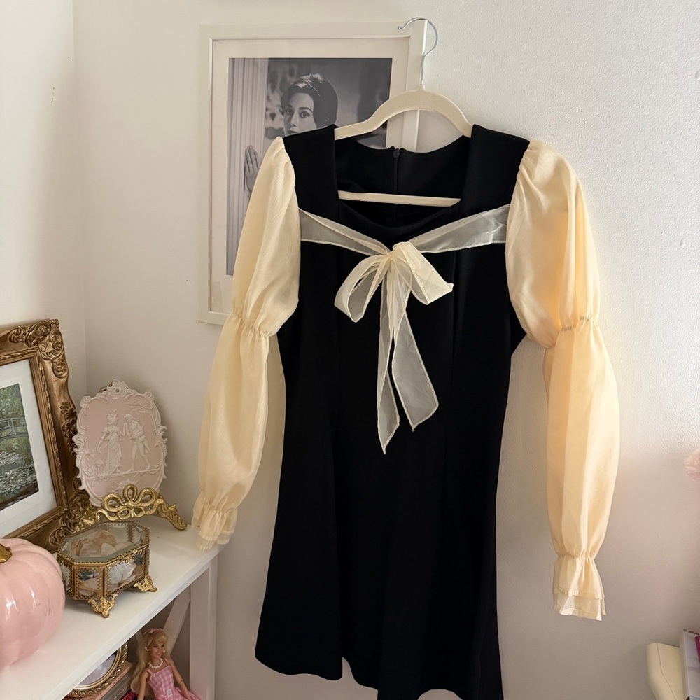 J.ING Elegant Black and Cream Dress with Bow Detail